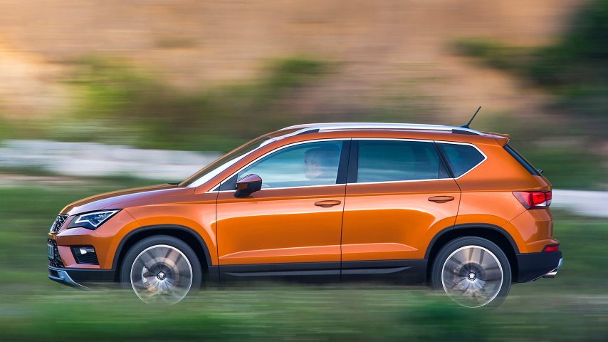 SEAT Ateca driving outside side view