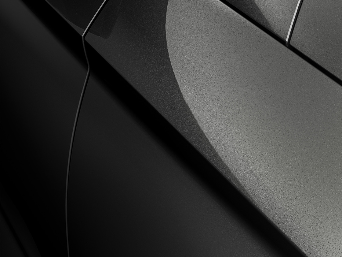 SEAT Ateca en negro Magic con acabado metalizado, primer plano
